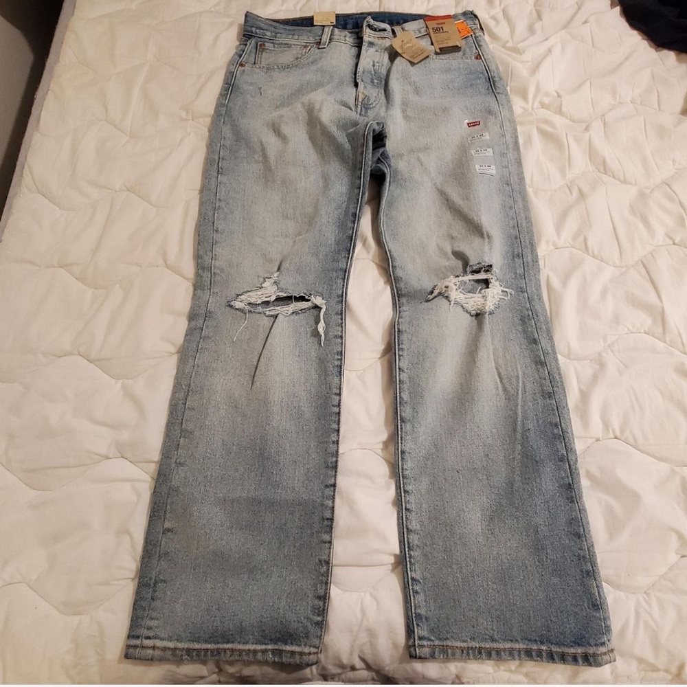 Levi's Light Blue Straight Jeans with Distressed Details